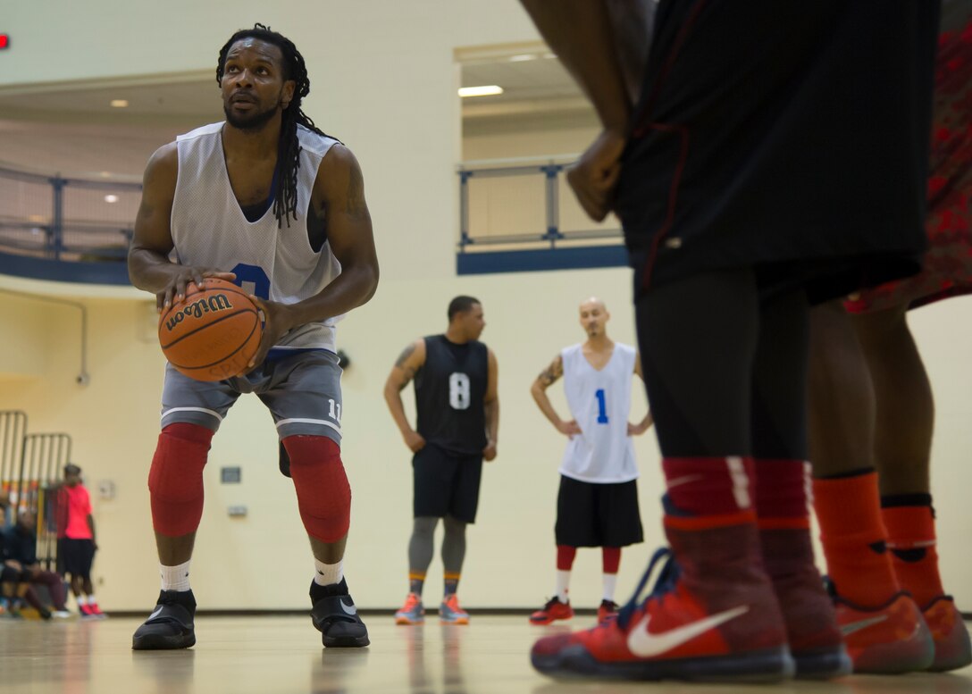Marcus Allen, forward for the Langley All-Stars, shoots a free-throw during the Joint Base Langley-Eustis all-star basketball game at Langley Air Force Base, Va., March 9, 2016. Allen is a two-time Langley intramural basketball champion, winning back-to-back championships with the 633rd Air Base Wing Force Support Squadron team. (U.S. Air Force photo by Staff Sgt. J.D. Strong II)