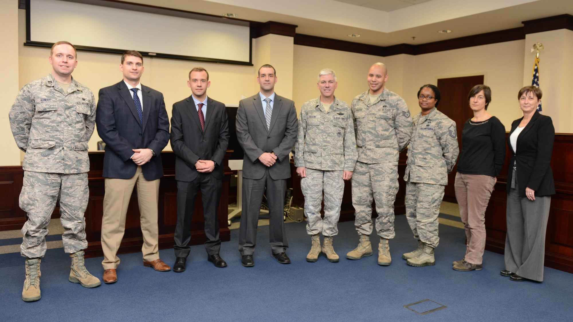 Brig. Gen. Barre Seguin, 31st Fighter Wing commander, recognizes the 31st FW judge advocate legal team for their efforts on the recent high profile general court-martial, March 9, 2016, at Aviano Air Base, Italy. The 31 FW/JA Airmen handle high profile cases and also assist the wing mission on international and general law issues. (U.S. Air Force photo by Senior Airman Austin Harvill/Released) 

