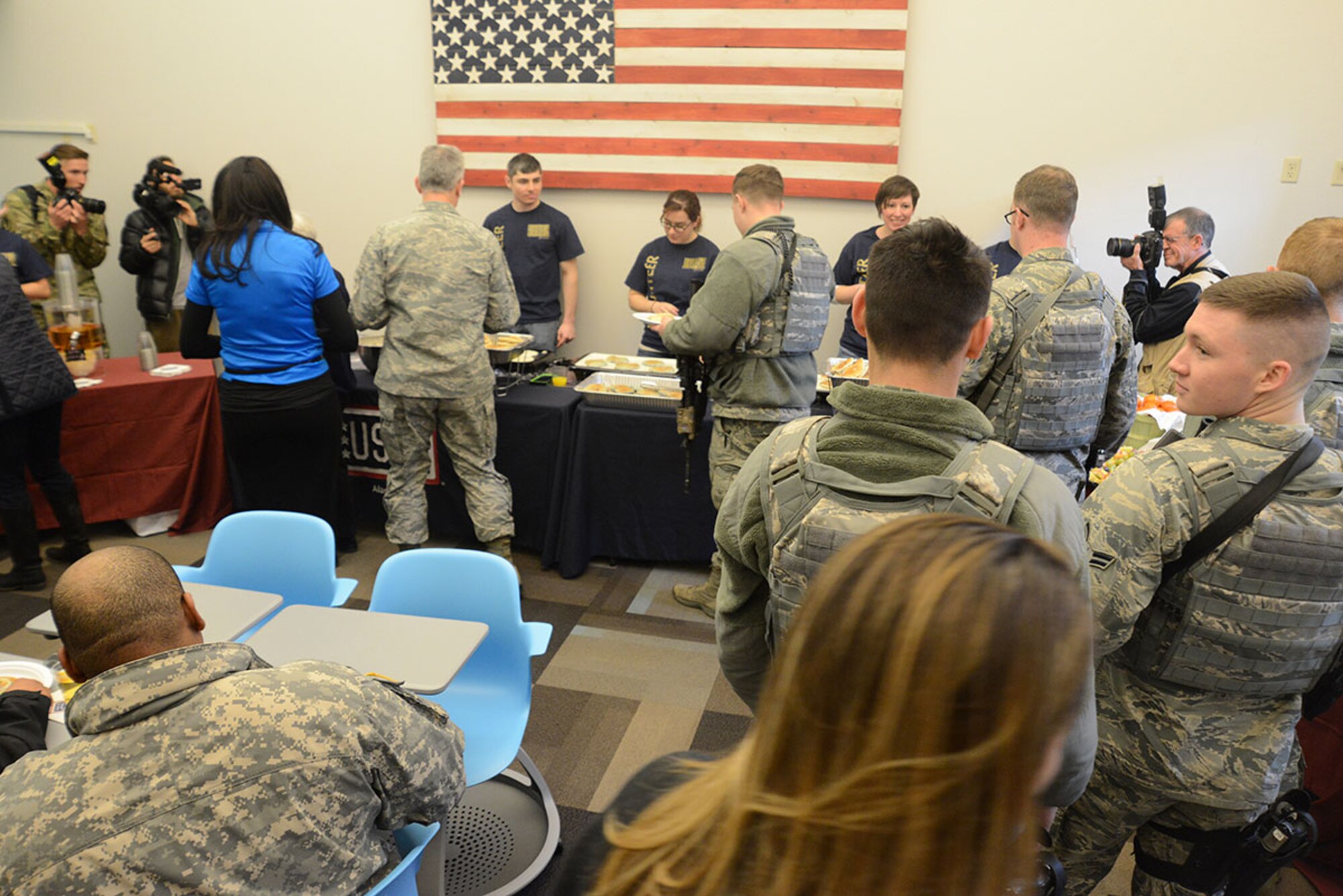 The USO Spring 2016 Entertainment Tour featuring Miss America Betty Cantrell, country singer and 10-year Army veteran Craig Morgan, Carolina Panthers football player Charles Tillman, and Ultimate Fighting Championship fighters Anthony Pettis and Donald ‘Cowboy’ Cerrone visit the Joint Base Elmendorf-Richardson USO, Alaska, for a pancake breakfast on their first stop March 12, 2016. The tour was led by Air Force Gen. Paul Selva, 10th Vice Chairman of the Joint Chiefs of Staff, who used this as an opportunity to visit Arctic Warriors. (U.S. Air Force photo by Airman 1st Class Christopher R. Morales)