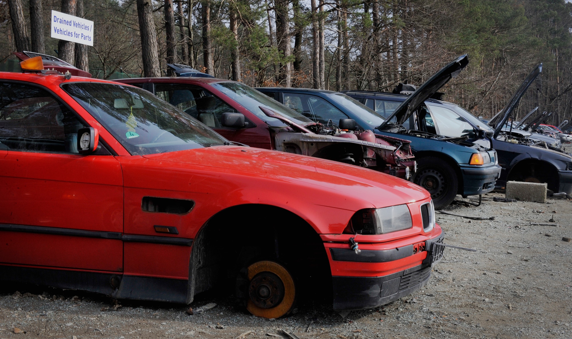 Cars are parked in the Ramstein Automotive Recycling Center parking lot March 1, 2016, at Ramstein Air Base, Germany. The center was established to give ID card holders and North American Trade Organization members the opportunity to dispose of their vehicles in a way that abides by German environmental standards. (U.S. Air Force photo/Airman 1st Class Larissa Greatwood)