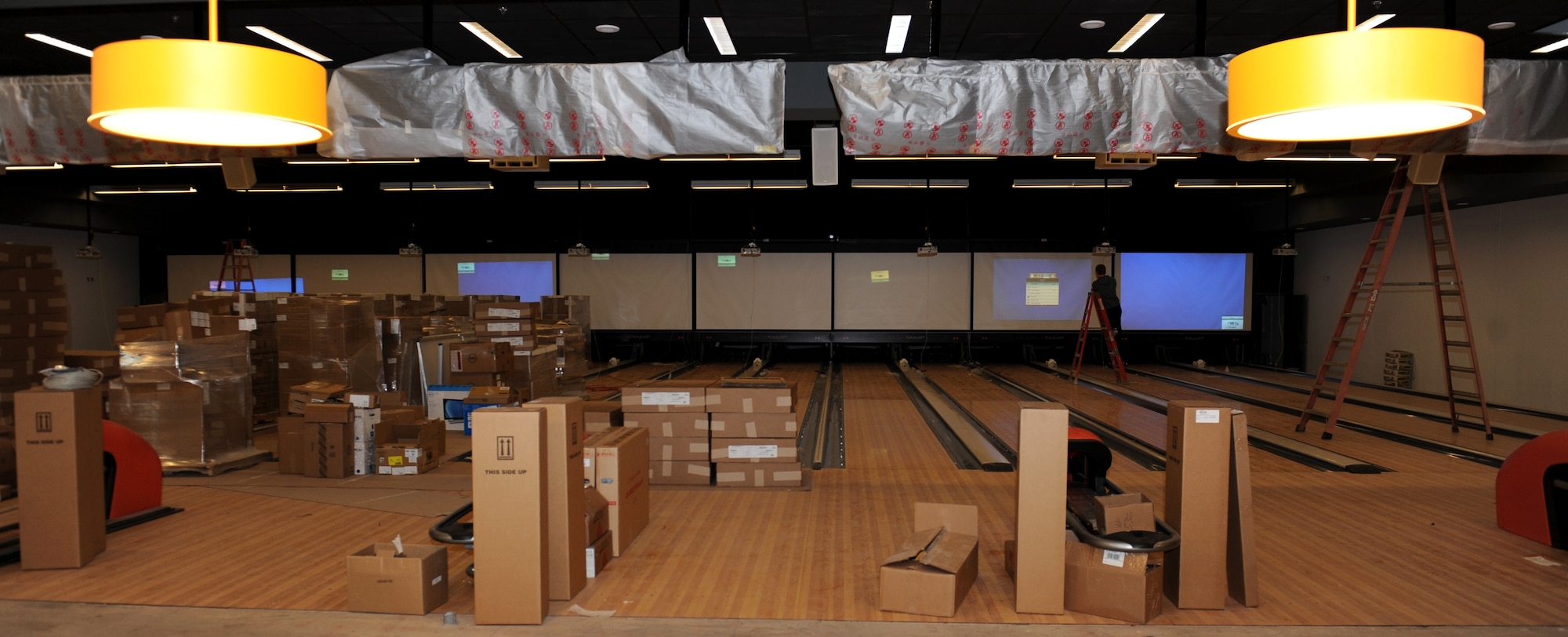 Building supplies sit atop the new Whiteman Bowling Center lanes at Whiteman Air Force Base, Mo., Feb. 23, 2016. Upon completion, the new Bowling Center will feature 16 lanes and a new entertainment system that will enable users to bowl traditional games or play a variety of modified game sets.
(U.S. Air Force photo by Tech Sgt. Miguel Lara)

