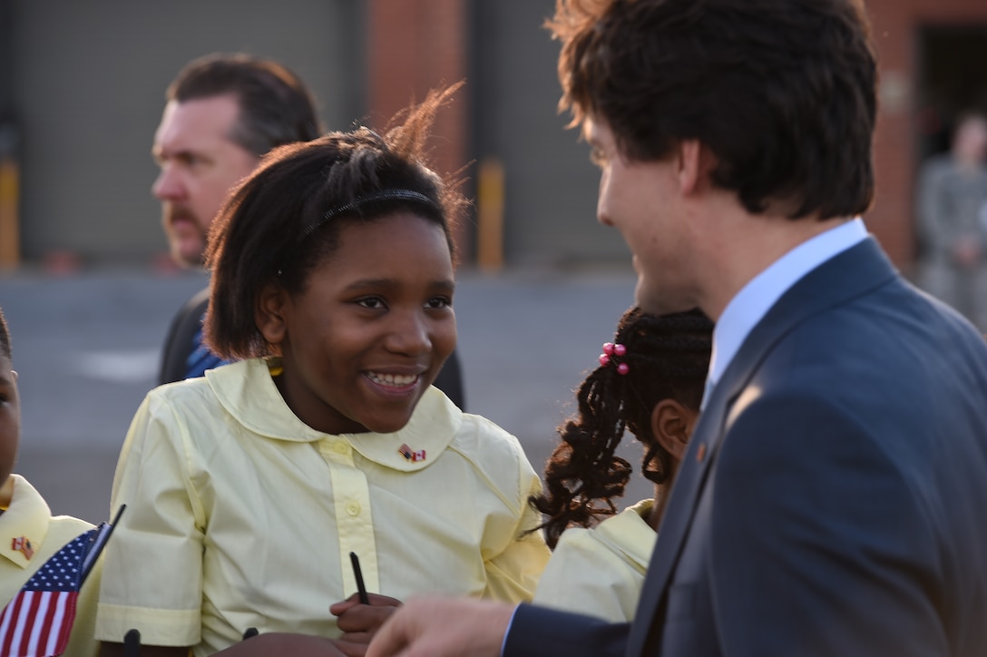 Canadian Prime Minister Justin Trudeau is greeted by District of Columbia school children at Joint Base Andrews, Md., March 11, 2016. Trudeau arrives in the U.S. for a three-day state visit with President Barack Obama to strengthen U.S.-Canadian relations. (U.S. Air Force photo by Senior Airman Joshua R. M. Dewberry/RELEASED)