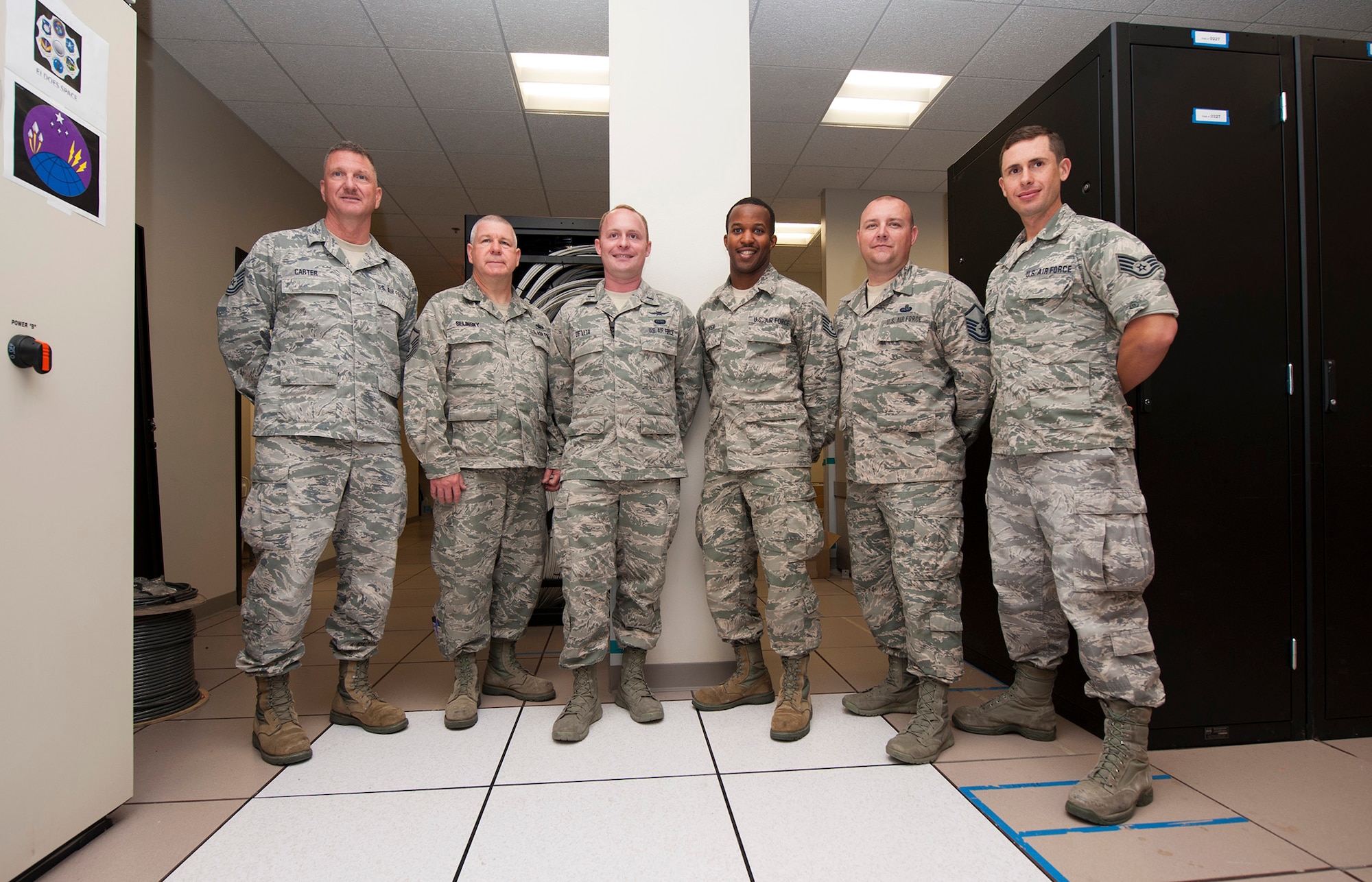 The Air National Guard Engineering Installation team at Vandenberg is headed up by Tech. Sgt. Brian Carter, 130th EIS, Communication Team Lead; Master Sgt. Michael Selinsky, 270th EIS, Range Simulation Center Team Lead; 1st Lt. Vincente De Vita, 130th EIS, ANG OIC; Tech. Sgt Aamir Cooper, 270th EIS, Telemetry Analog Equipment Room Team Lead; Master Sgt. Kyle Wood, 130th EIS, ANG NCOIC/Team Chief; and Staff Sgt. Chris Cox, 217th EIS, Range Data Control Center Team Lead. (U.S. Air Force photo by Michael Peterson/released)