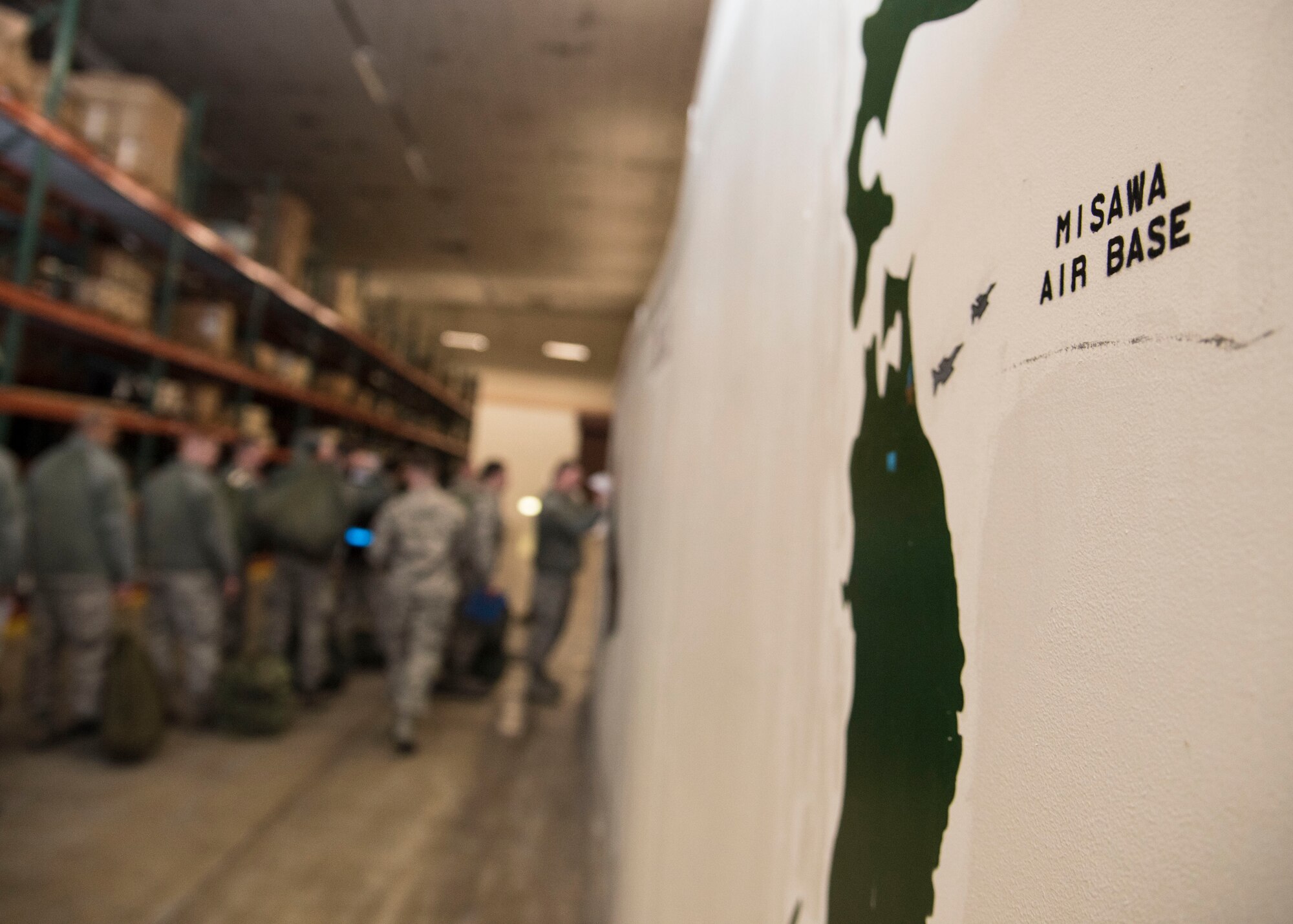 A mural of the map of Japan lines the wall at Misawa Air Base, Japan, March 15, 2016. During Beverly Sunrise 16-03, an operational readiness exercise, Airmen attended a mock Personnel Deployment Function to ensure they were fit for duty. (U.S. Air Force photo by Airman 1st Class Jordyn Fetter)