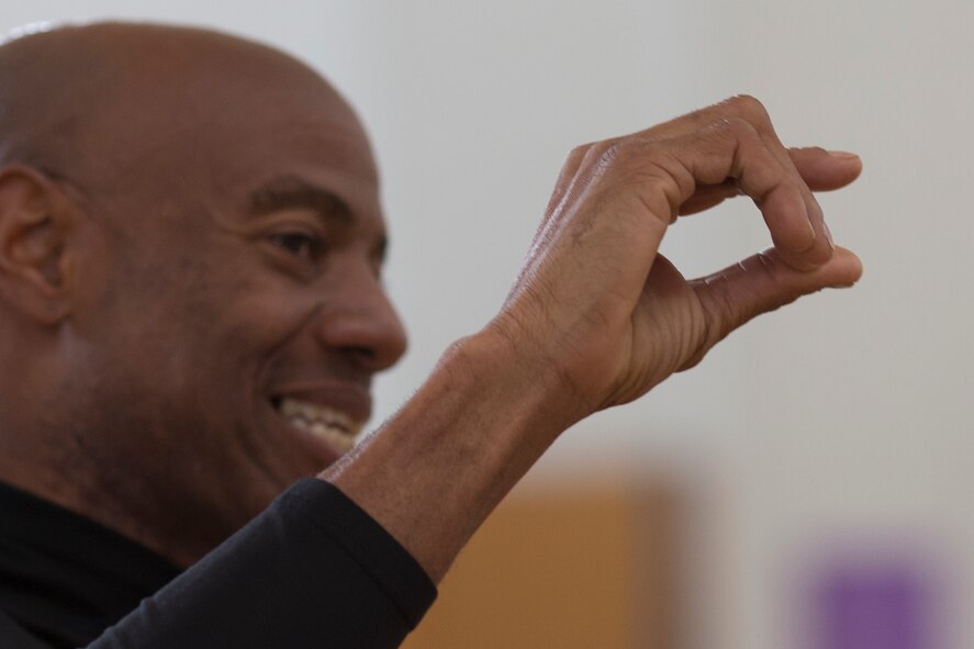 Mike Powell, former Olympic participant, shares his long jump experience during the World Records Camp at Yokota Air Base, Japan, March 12, 2016. Powell broke the long jump world record by 2 inches, leaping 8.95m in the 1991 World Championships in Athletics in Tokyo. (U.S. Air Force photo by Osakabe Yasuo/Released)