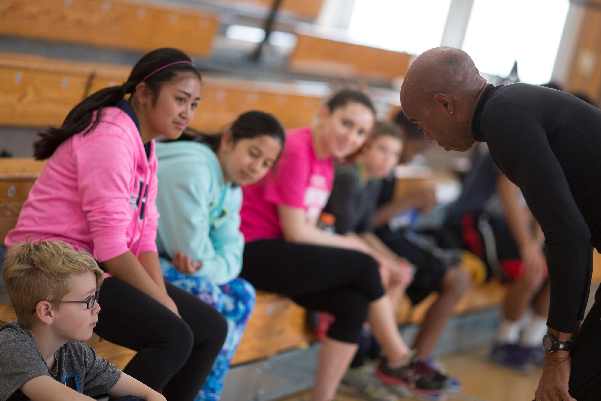 Mike Powell, right, former Olympic participant, talks about his Olympic experience to participants during the World Records Camp at Yokota Air Base, Japan, March 12, 2016. Powell is a two-time world champion in events and three-time Olympian. (U.S. Air Force photo by Osakabe Yasuo/Released) 