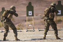 Marines with Marine Wing Support Squadron 371, based out of Marine Corps Air Station Yuma, perform shooting drills with their M16A4 service rifles during a squadron field exercise at the U.S. Army Yuma Proving Ground training facility in Yuma, Ariz., Wednesday, March 9, 2016.