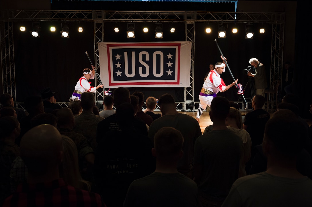 Japanese entertainers perform a traditional dance for troops and family members during a USO spring entertainment show on Camp Hansen, Japan, March 13, 2016. DoD photo by Army Staff Sgt. Sean K. Harp