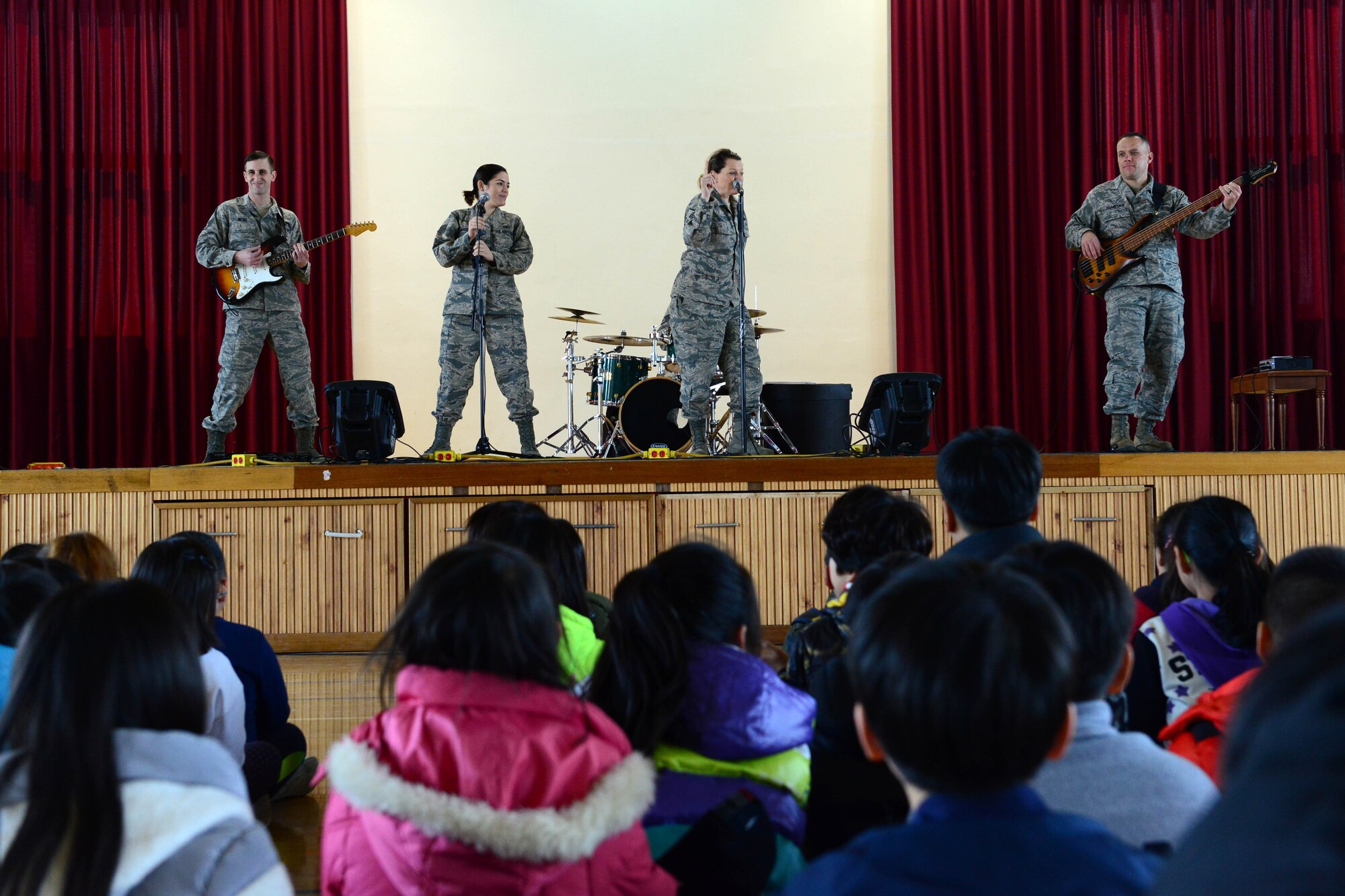 The U.S. Air Force Band of the Pacific-Asia Pacific Trends ensemble performs at the Ilmakwon Welfare facility and Okbong Elementary school in Gunsan City, Republic of Korea, Mar. 15, 2016. The PACAF band, based at Yokota Air Base, Japan, consists of 24 members. It also has a 12 member detachment stationed at Joint Base Pearl Harbor-Hickam, Hawaii. (U.S. Air Force photo by Senior Airman Ashley L. Gardner/Released)