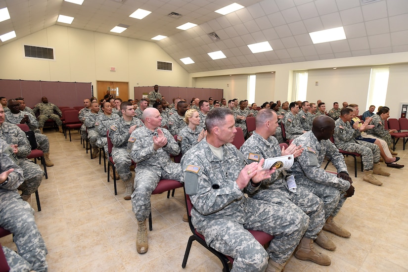 Active component and Army Reserve soldiers applaud during an Army Reserve 107th birthday celebration held at the North Fort Hood Chapel, May 2. Brig. Gen. Frederick R. Maiocco, Jr. commanding general, 85th Support Command and deputy commanding general, First Army Division West; gave remarks during the ceremony with Maj. Gen. Jeffrey N. Colt, commanding general, First Army Division West, also in attendance. (U.S. Army photo by Sgt. 1st Class Anthony L. Taylor/Released)
