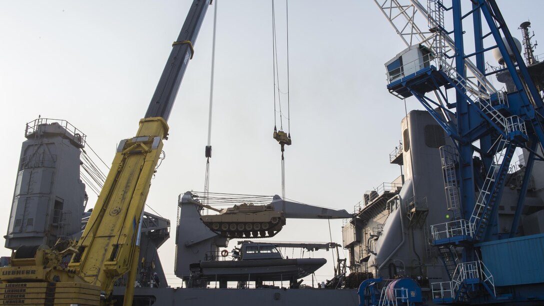 A M1A1 Abram tank attached to Delta Company 1st Tank Battalion, 1st U.S. Marine Division is lifted by two pier side cranes onto amphibious dock landing ship USS Ashland (LSD 48) at Gwangyang, South Korea to prepare for the Assault Follow-On Echelon portion of Exercise Ssang Yong 2016 March 14, 2016. Ashland is assigned to the Bonhomme Richard Expeditionary Strike Group and is participating in SY16, a biennial combined amphibious exercise conducted by forward-deployed U.S. forces with the Republic of Korea Navy and Marine Corps, Australian Army and Royal New Zealand Army Forces in order to strengthen our interoperability and working relationships across a wide range of military operations-from disaster relief to complex expeditionary operations.