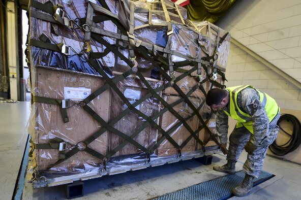 Staff Sgt. Mark Scott, engineering support NCO in-charge with the 1st Special Operations Civil Engineer Squadron, inspects a pallet of supplies at Hurlburt Field, Fla., March 14, 2016. Air Commandos participated in a mobility exercise to showcase their ability to deploy at a moment’s notice ‘Any Time, Any Place.’ (U.S. Air Force photo by Senior Airman Jeff Parkinson)