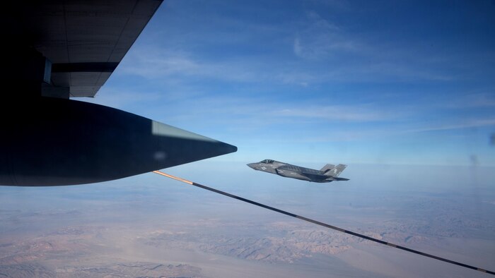 An F-35B Lightning II with Marine Fighter Attack Squadron 121 “Green Knights” flies alongside a KC-130J Super Hercules with Marine Aerial Refueler Transport Squadron 352 over Southern California, March 8, 2016. An aerial refuel, also called air-to-air refuel, allows the F-35B to perform close air support missions for a longer period of time.
