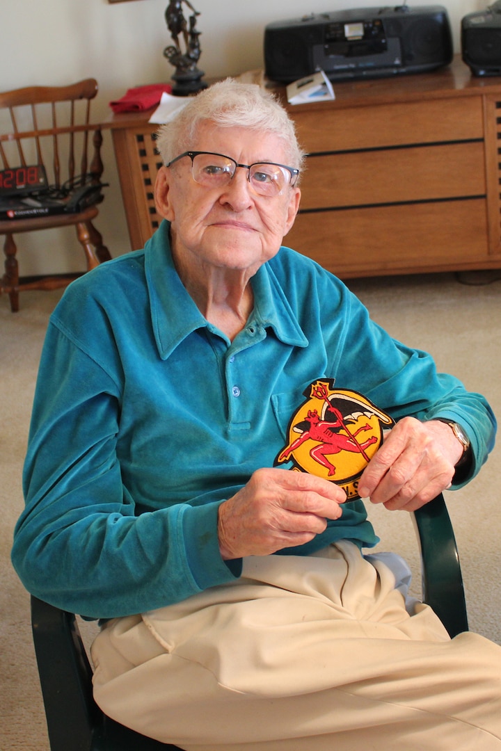 Philas Kelly, who served in the Michigan National Guard from 1937 to 1940, holds his 107th Observation Squadron patch from his days in uniform. Kelly visited the 107th Fighter Squadron at Selfridge Air National Guard Base, Mich., on March 15, 2016, to learn about the current mission of his old unit. 