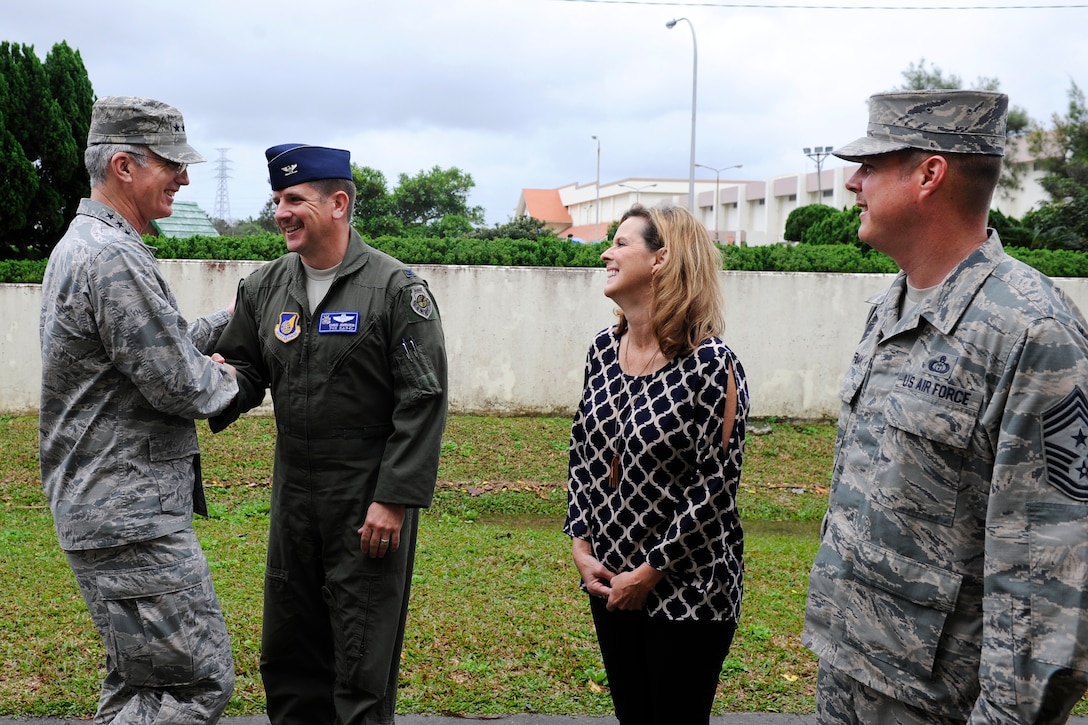 Air Force Gen. Paul J. Selva, left, vice chairman of the Joint Chiefs of Staff, exchanges greetings with Col. Christopher Amrhein; his wife, Cathy; and Chief Master Sgt. Charles Hoffman before the USO spring entertainment visit on Kadena Air Base, Japan, March 14, 2016. Amrhein and Hoffman are the vice commander and command chief master sergeant, respectively, of the 18th Wing. Air Force photo by Senior Airman Peter Reft
