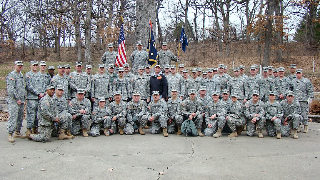 Army Reserve soldiers assigned to 1st Battalion, 383rd Training Support Battalion, 166th Aviation Brigade, First Army Division West – based at Fort Des Moines, pause for a photo during a project with the City of Des Moines Parks and Recreation Department, to help restore the Greenwood Park in Des Moines, Iowa, April 5. (Photo by Capt. Mark Butcher)