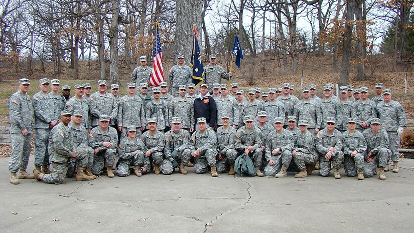 Army Reserve soldiers assigned to 1st Battalion, 383rd Training Support Battalion, 166th Aviation Brigade, First Army Division West – based at Fort Des Moines, pause for a photo during a project with the City of Des Moines Parks and Recreation Department, to help restore the Greenwood Park in Des Moines, Iowa, April 5. (Photo by Capt. Mark Butcher)