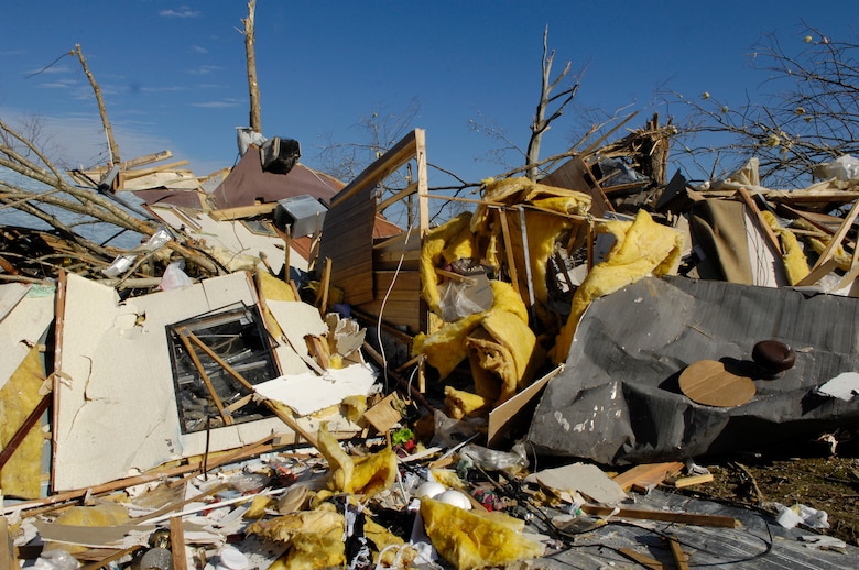 This pile of debris shows the vivid reality of how lives are impacted by tornadoes. Damage is clearly conveyed in this photo taken shortly after tornadoes touched down on February 5, 2008.