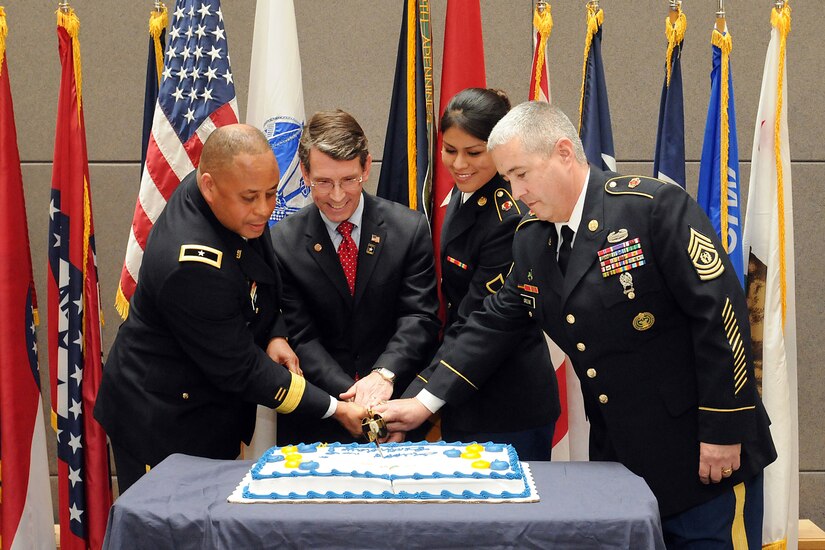 From left to right, Brig. Gen. Gracus K. Dunn, commanding general, 85th Support Command and seputy commanding general for support, First Army Division-West; Mayor Thomas Hayes, mayor of Arlington Heights, Ill., and former West Point U.S Military Academy graduate; Pfc. Yvette Leon, Human Resources specialist, and the command’s most junior soldier; and Command Sgt. Maj. Kevin Greene, command sergeant major, 85th Support Command and senior enlisted soldier cut a cake during the 106th birthday celebration of the Army Reserve at the unit’s headquarters near Chicago on April 5. (U.S. Army photo by Sgt. 1st Class Anthony L. Taylor/Released)