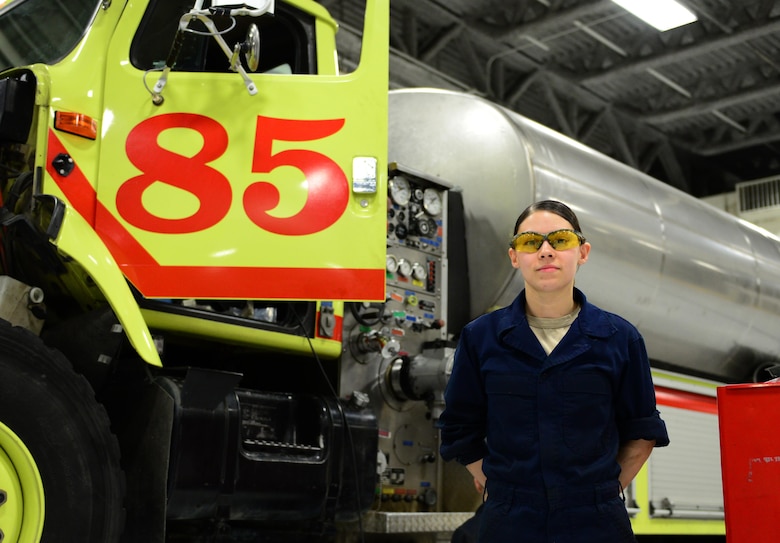 U.S. Air Force Staff Sgt. Vanessa Hoppough, a 354th Logistics Readiness Squadron special vehicle maintenance journeyman, takes a quick break March 2, 2016, at Eielson Air Force Base, Alaska. Hoppough said her favorite part of her job is when everything goes smoothly to get the job done. (U.S. Air Force photo by Airman 1st Class Casandra Whitman/Released)