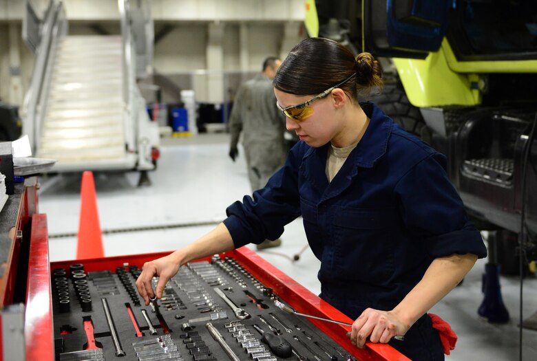 U.S. Air Force Staff Sgt. Vanessa Hoppough, a 354th Logistics Readiness Squadron special vehicle maintenance journeyman, selects a tool March 2, 2016, at Eielson Air Force Base, Alaska. Hoppough keeps her tool box organized to efficiently find whatever she needs to successfully work on vehicles. (U.S. Air Force photo by Airman 1st Class Cassandra Whitman/Released)