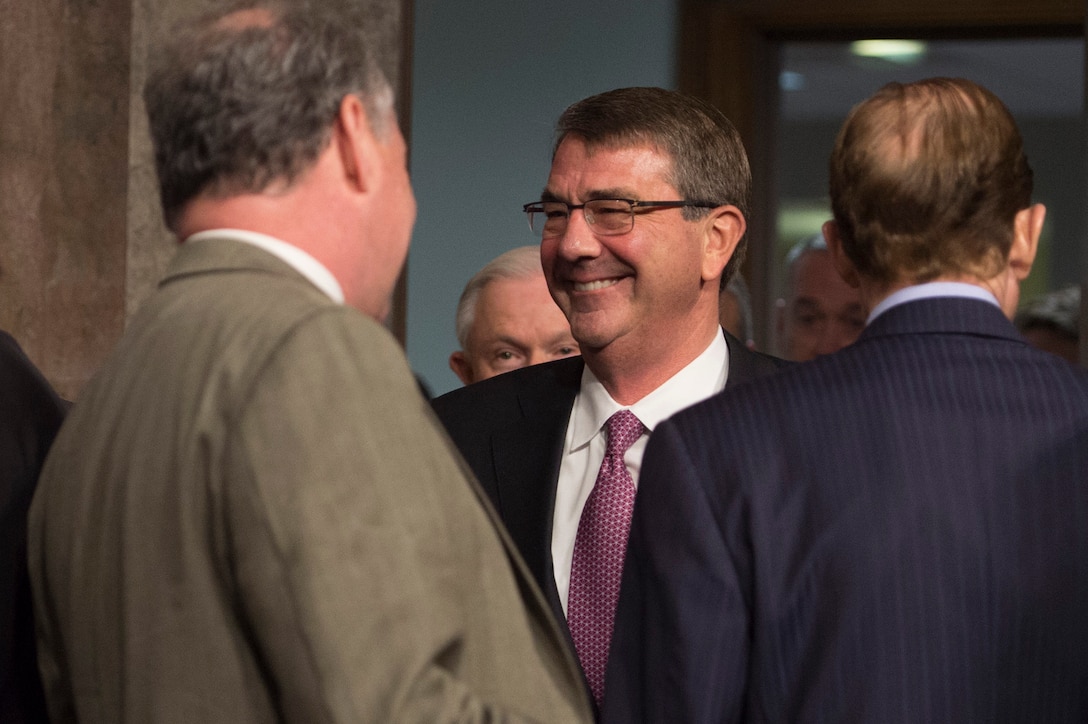 Defense Secretary Ash Carter shares a light moment before he testifies on the Defense Department's proposed fiscal year 2017 budget during a posture hearing before the Senate Armed Services Committee in Washington, D.C., March 17, 2016. DoD photo by Air Force Senior Master Sgt. Adrian Cadiz