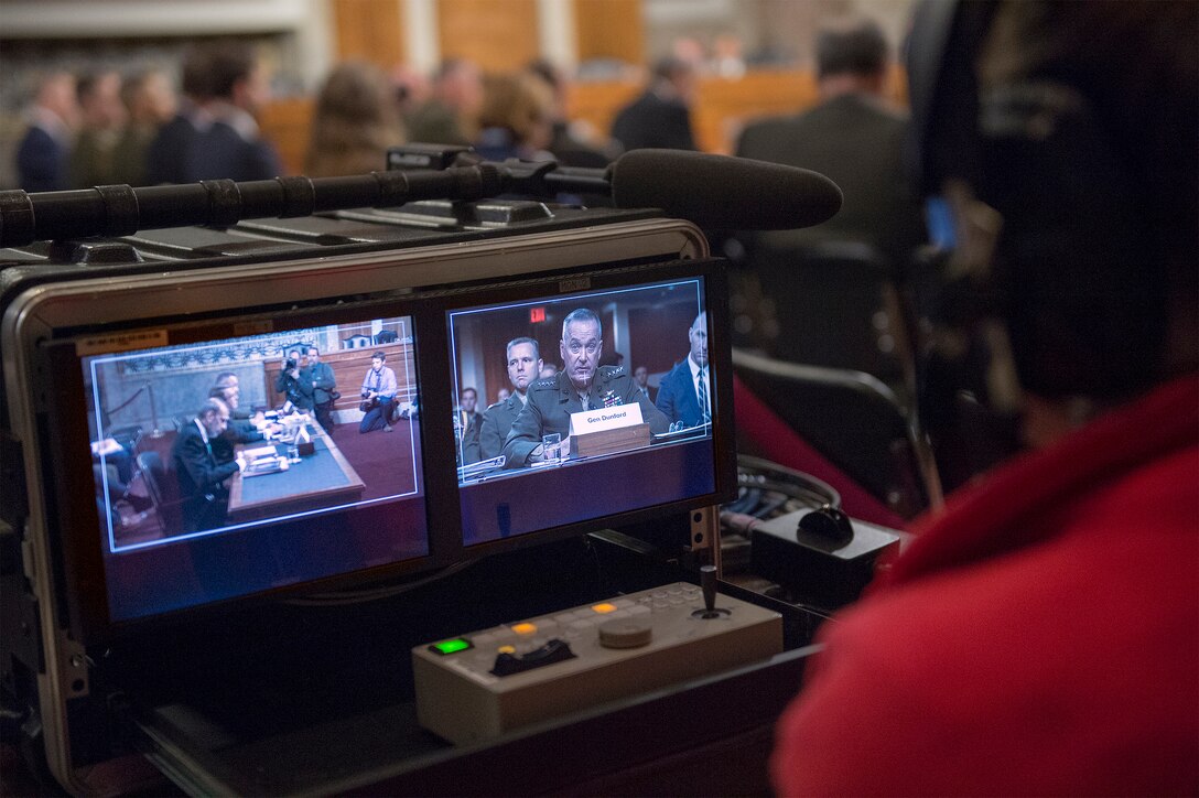 Monitors show Marine Corps Gen. Joseph F. Dunford, chairman of the Joint Chiefs of Staff, as he testifies on the Defense Department's proposed fiscal year 2017 budget before the Senate Armed Services Committee in Washington, D.C., March 17, 2016. DoD photo by Navy Petty Officer 2nd Class Dominique A. Pineiro