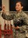 Airman 1st Class Victoria Hammond, 2nd Civil Engineer Squadron emergency manager, shows Airmen a self-sealing disk valve during chemical, biological, radiological and nuclear defense survival skills training at Barksdale Air Force Base, La., March 8, 2016. Hammond taught the Airmen how to inspect different pieces of equipment for tears, slits and degradation. (U.S. Air Force photo/Senior Airman Amanda Morris)
