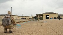Airmen cordon an unexploded ordnance training aid during chemical, biological, radiological and nuclear defense survival skills training at Barksdale Air Force Base, La., March 8, 2016. Cordoning warns others of possible dangers and prevents access to the area. (U.S. Air Force photo/Senior Airman Amanda Morris)