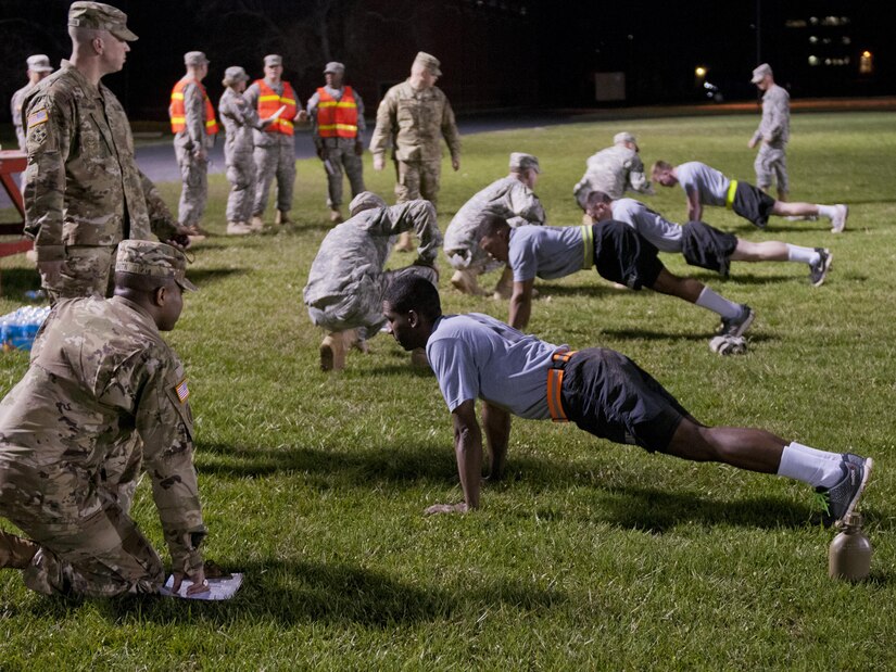 U.S. Army Reserve Soldiers, competing in the 316th Sustainment Command (Expeditionary) Best Warrior Competition, performs pushups during the Army Physical Fitness Test at Fort Knox, Ky., March 16, 2016. (U.S. Army photo by Staff Sgt. Dalton Smith/Released)