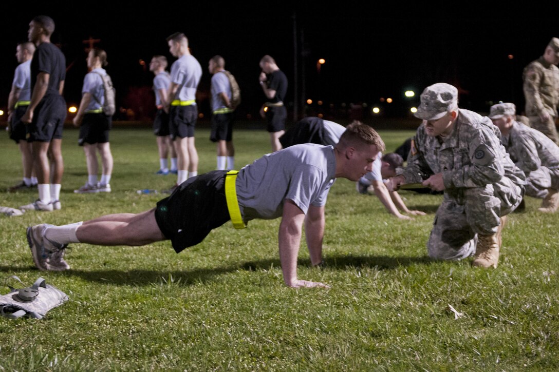 Spc. Stephen McCarthy, with the 444th Human Resources Company, performs pushups during the Army Physical Fitness Test for the 316th Sustainment Command (Expeditionary) Best Warrior Competition at Fort Knox, Ky., March 16, 2016. (U.S. Army photo by Staff Sgt. Dalton Smith/Released)