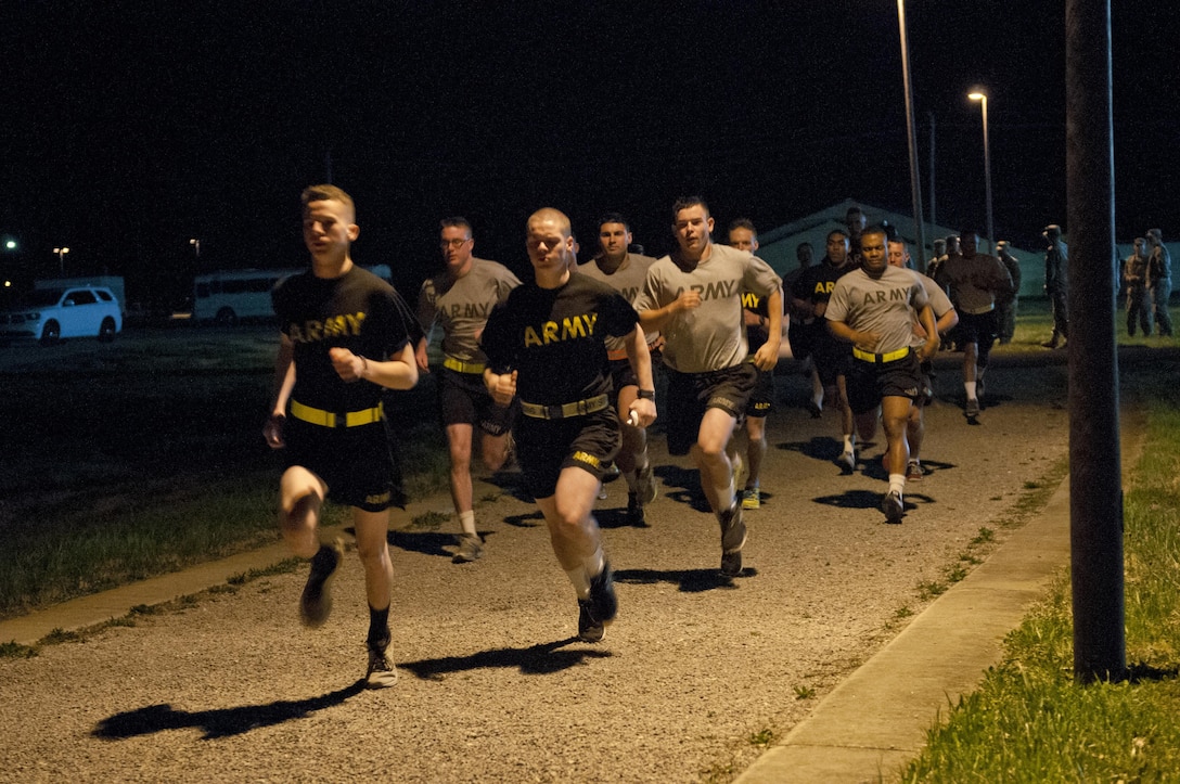 U.S. Army Reserve Soldiers, competing in the 316th Sustainment Command (Expeditionary) Best Warrior Competition, begin the two mile run portion of the Army Physical Fitness Test at Fort Knox, Ky., March 16, 2016. (U.S. Army photo by Staff Sgt. Dalton Smith/Released)