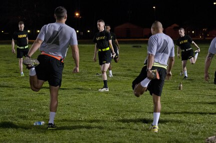 U.S. Army Reserve Soldiers, competing in the 316th Sustainment Command (Expeditionary) Best Warrior Competition, stretch prior to the Army Physical Fitness Test at Fort Knox, Ky., March 16, 2016. (U.S. Army photo by Staff Sgt. Dalton Smith/Released)