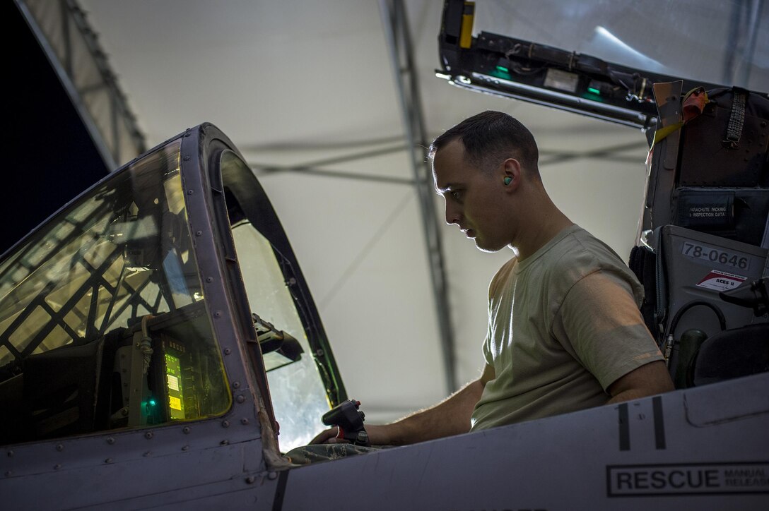 U.S. Air Force Staff Sgt. Matthew Hebert, 74th Aircraft Maintenance Unit avionics specialist technician, repairs the display of an A-10C Thunderbolt II, March 10, 2016, at Moody Air Force Base, Ga. The 74th AMU swing shift maintainers work long hours each night, often working into early hours of the morning. (U.S. Air Force photo by Airman 1st Class Lauren M. Johnson/Released)