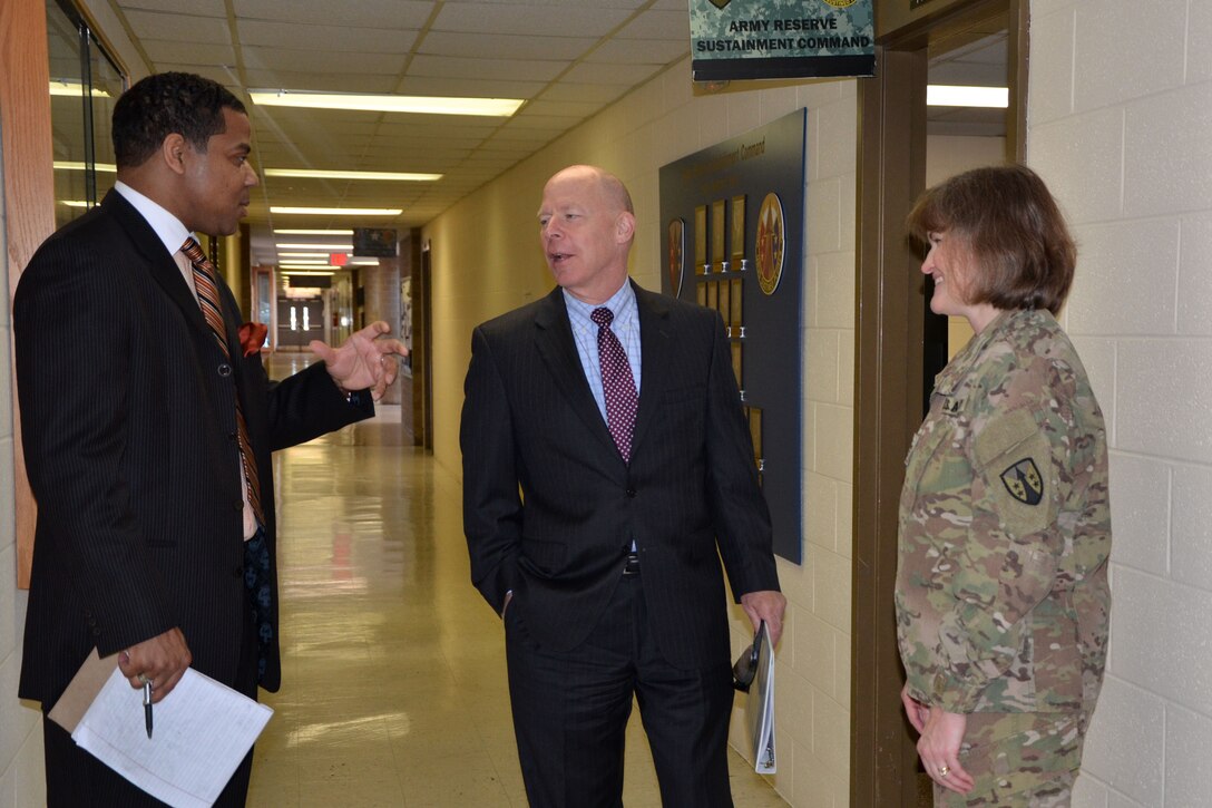 Mr. James Balocki, United States Army Reserve Command’s executive officer and director, services and installations, discusses the facility with Mr. Andre Clark, supervisory staff administrator for the Army Reserve Sustainment Command and Col. Janet Townley, ARSC Chief of Staff. 