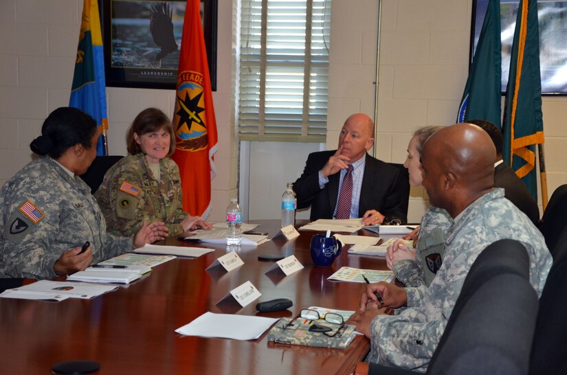 Lt. Col. Constance Garcia, deputy operations officer for the Army Reserve Sustainment Command, provides Mr. James Balocki, United States Army Reserve Command’s executive officer and director, services and installations, a brief overview of how the organization supports the active duty force.  