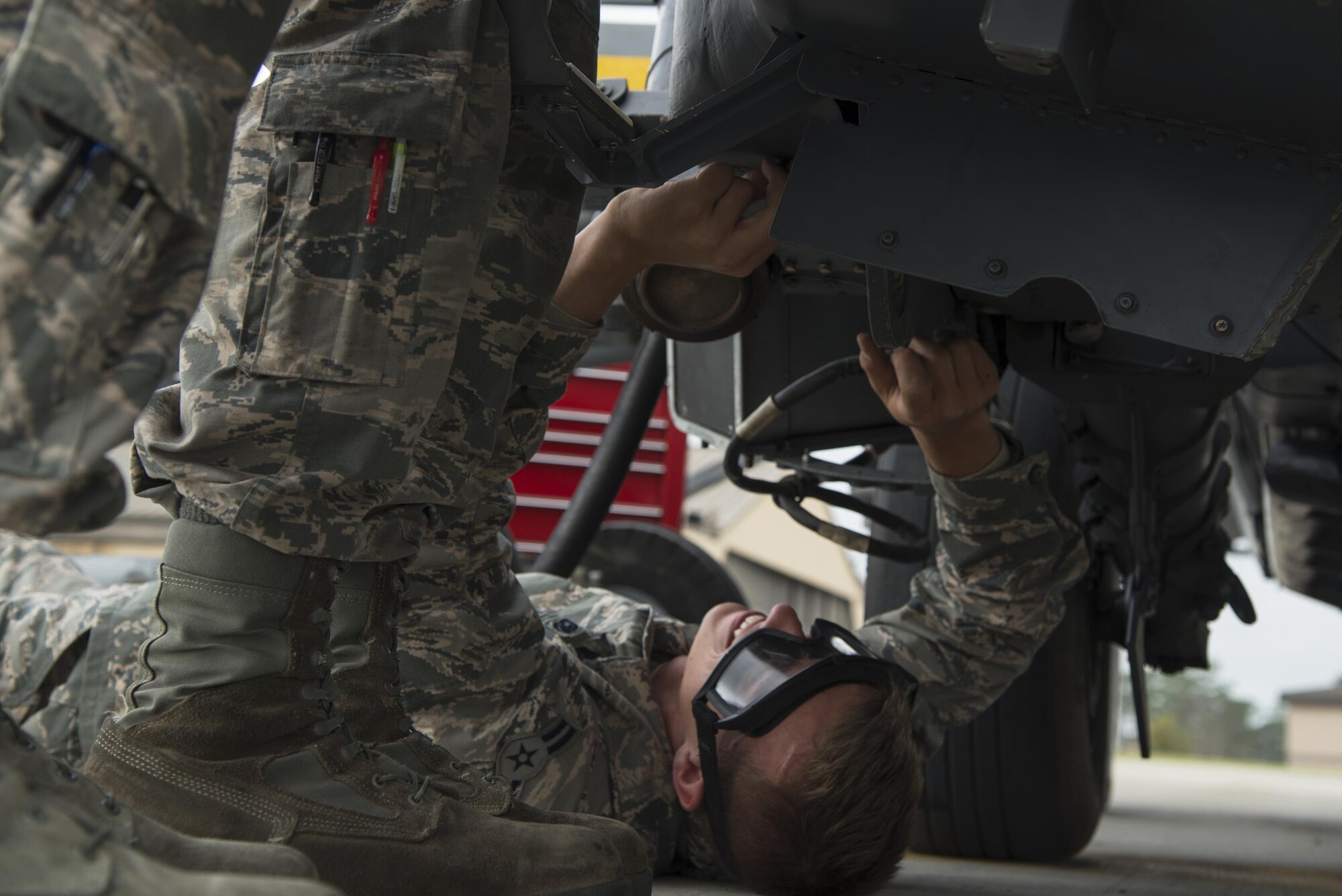 U.S. Air Force Airman 1st Class Edward Devincenzi, 41st Helicopter Maintenance Unit crew chief journeyman, secures a support fairing to an HH-60G Pave Hawk helicopter, March 16, 2016, at Moody Air Force Base, Ga. This particular fairing holds a green LED light indicating directional position while the HH-60G is in flight. (U.S. Air Force Photo by Airman 1st Class Janiqua P. Robinson/Released)
