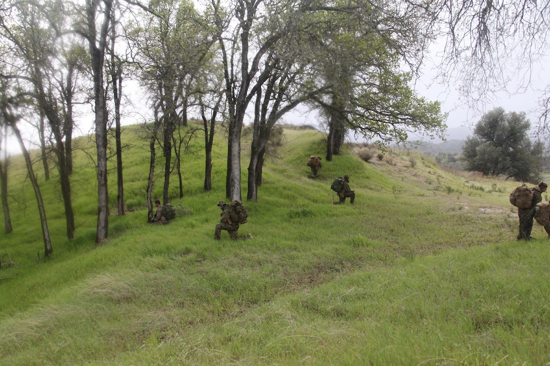 A reconnaissance team with 4th Force Reconnaissance Company, 4th Marine Division, Marine Forces Reserve, prepares to conduct a long range patrol movement to an observation post at Fort Hunter Liggett, Calif., March 8-12, 2016. The Marines conducted surveillance, patrolling and land navigation along their route to the observation post. (Photo courtesy of 4th Force Recon)