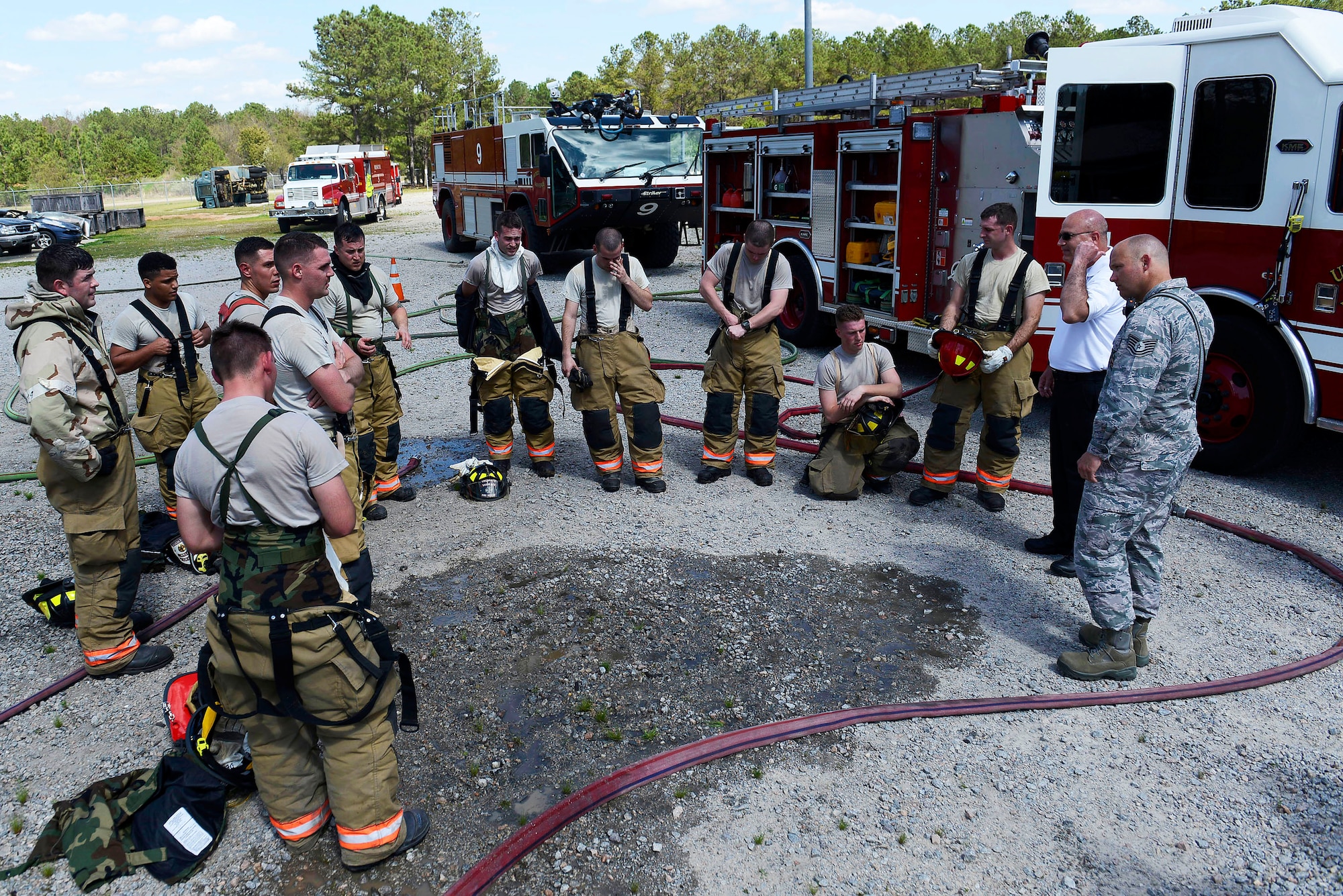 U.S. Airmen assigned to the 20th Civil Engineer Squadron fire department participate in a hot wash on their training procedures at Shaw Air Force Base, S.C., March 14, 2016. Airmen assigned to the 20th CES fire department are given extensive training and procedures that must be executed effectively with minimal errors. (U.S. Air Force photo by Airman 1st Class Christopher Maldonado)
