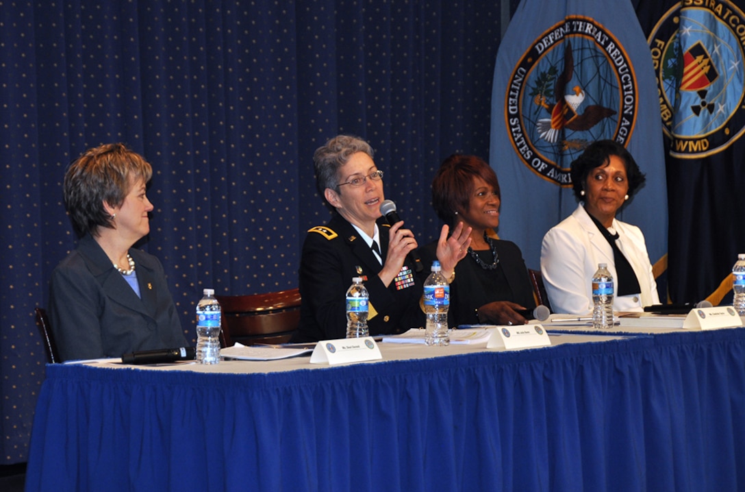 Army Maj. Gen. Julie Bentz, vice director, Joint Improvised-Threat Defeat Agency, answers a question. Other panelists (from left): Shari Durand, executive director, Defense Threat Reduction Agency; Clothilda Taylor, principal deputy director, administration, Office of the Under Secretary of Defense; and retired Air Force Chief Master Sgt. Helen Noel.
