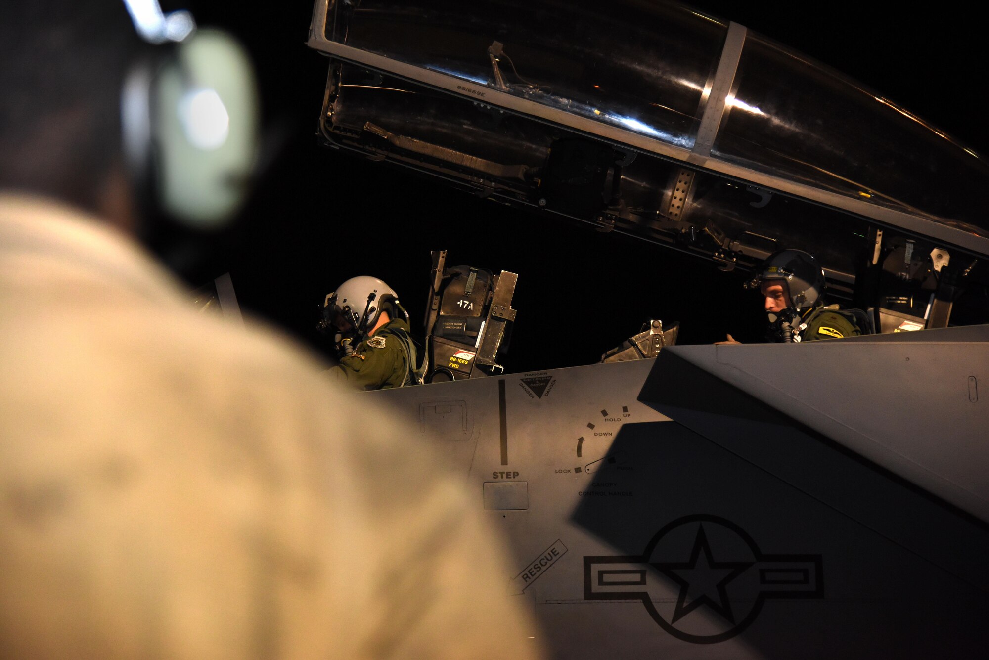 Lt. Col. Lucas Teel, 336th Fighter Squadron commander and F-15E pilot, and Maj. Lucas Ball, 336th FS weapons systems officer, strap into a Strike Eagle while Senior Airman Brandon Farmer, 4th Aircraft Maintenance Squadron crew chief, waits to begin pre-flight checks March 9, 2016, at Nellis Air Force Base, Nevada. During Red Flag 16-2, aircrew and maintainers worked hand-in-hand to launch jets for missions during the two-week exercise. (U.S.Air Force photo/Staff Sgt. Chuck Broadway)