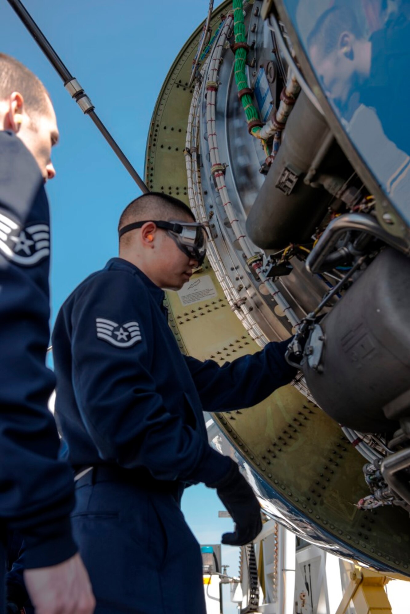 Staff Sgt. Lawrence Lin, a 89th Maintenance Group flying crew chief, inspects engine compartments of an 89th Airlift Wing C-32A Executive Transport at Travis Air Force Base, Calif., Sept. 14, 2015. As an FCC, Lin is responsible for on- and off-station maintenance of 1st Airlift Squadron C-40B Clipper and C-32A aircraft. (U.S. Air Force photo/Senior Master Sgt. Kevin Wallace)