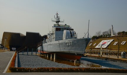 Republic of Korea Navy Patrol Killer Medium 357 from the second Yeonpyeong Sea Battle is shown outside of the West Sea Protection Hall at the ROK Navy 2nd Fleet Command in Pyeongtaek-si, Gyeonggi-do Province on Feb. 26, 2016. The sea battles took place June 15, 1999, and June 29, 2002, and are two of recent attacks on South Korea from North Korea patrols. (U.S. Air Force photo by Senior Airman Kristin High/Released)