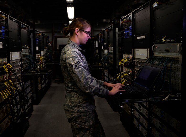 Airman 1st Class Ashley, 432nd Aircraft Communications Maintenance Squadron radio frequencies transmission technician checks a control monitor and alarm computer for discrepancies  Aug. 19, 2015, at Creech Air Force Base, Nevada. The ACMS is responsible for maintaining all communications equipment needed to fly a remotely piloted aircraft. (U.S. Air Force photo by Airman 1st Class Christian Clausen/Released)