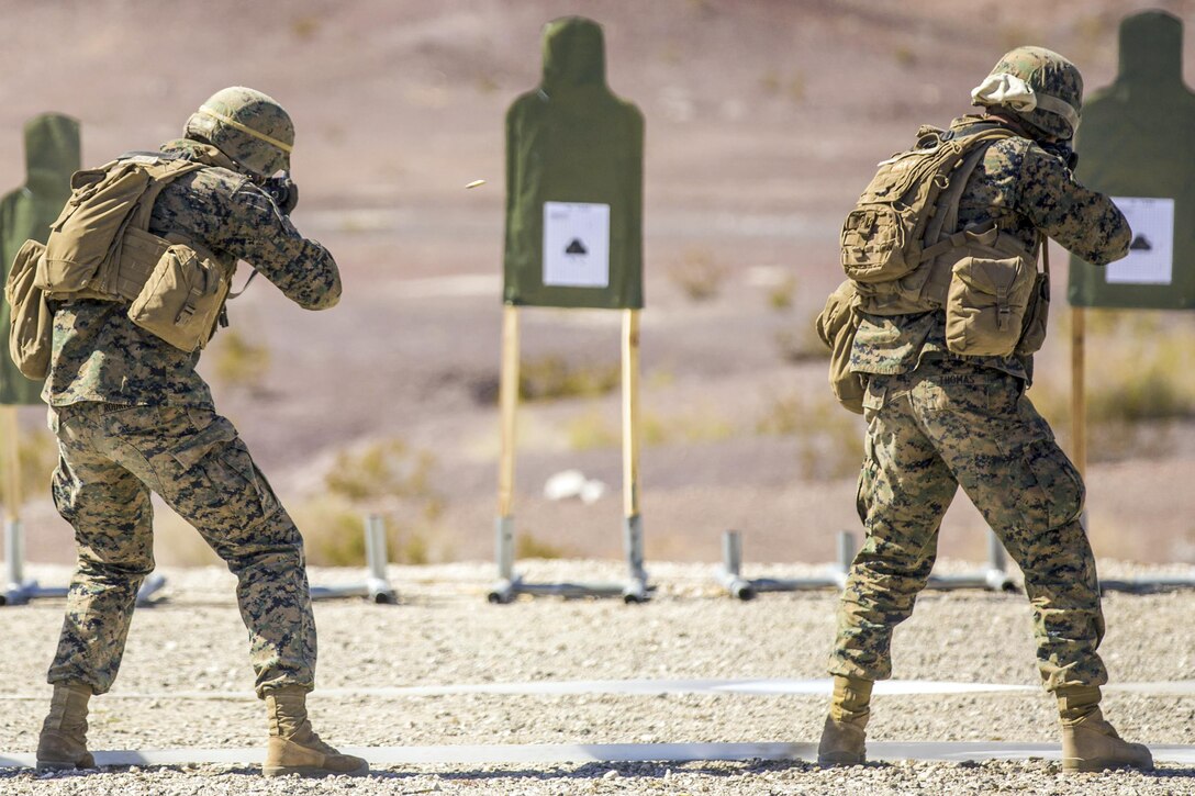 Marines perform shooting drills with their M16A4 service rifles during a squadron field exercise at the Yuma Proving Ground in Yuma, Ariz., March 9, 2016. Marine Corps photo by Pfc. George Melendez