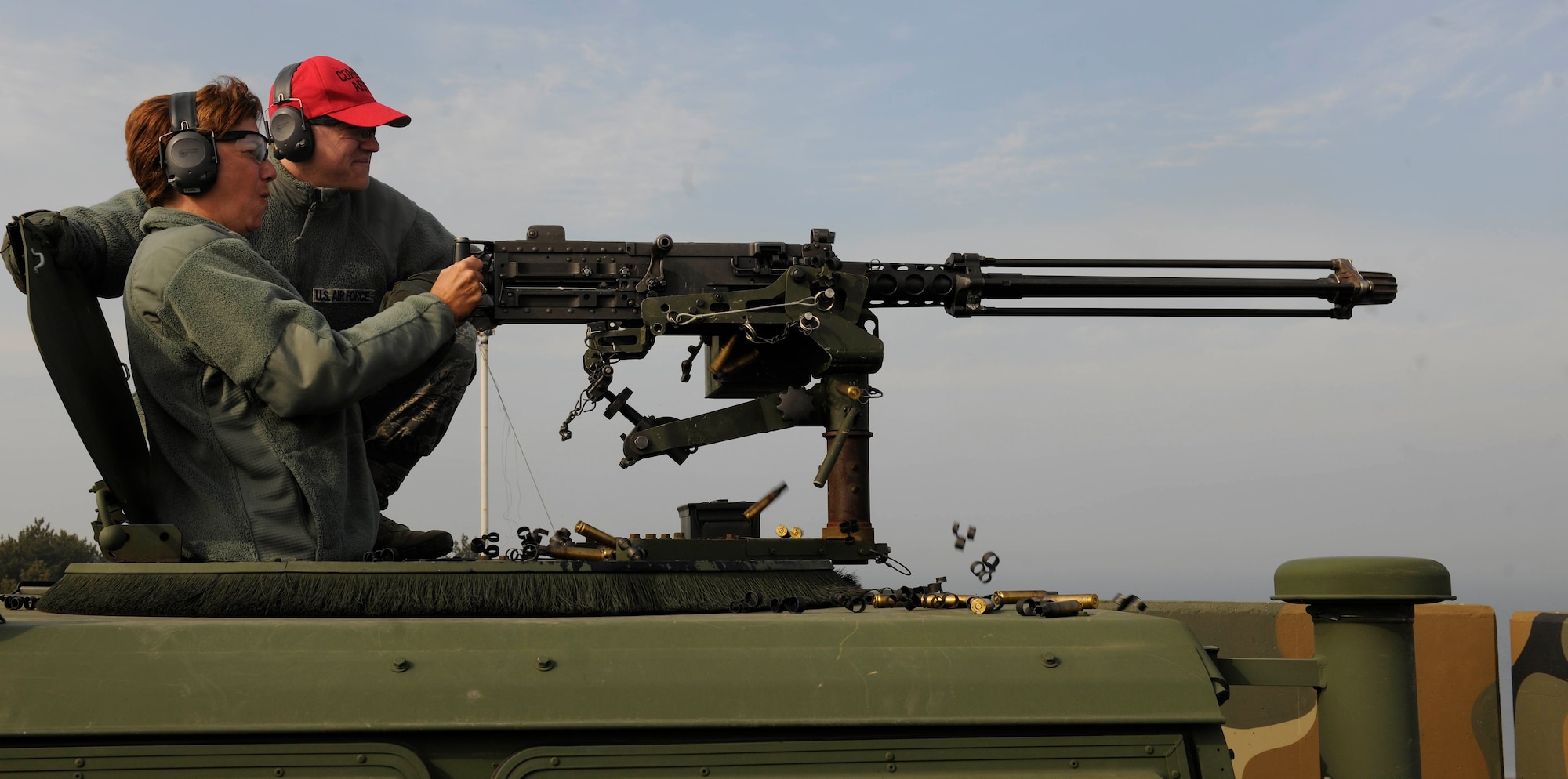 Gen. Lori J. Robinson, Pacific Air Forces commander, prepares to shoot a M2 .50 caliber machine-gun following instruction from an 8th Security Forces Squadron combat arms instructor during her visit to Kunsan Air Base, Republic of Korea, March 17, 2016. Robinson had the opportunity to see firsthand how Kunsan Airmen contribute to deterring aggression on the Korean Peninsula during her visit.