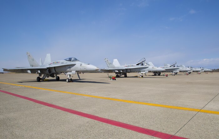 F/A-18A++ Hornets with Marine Fighter Attack Squadron(VMFA) 314, forward based at Marine Corps Air Station Iwakuni, Japan, are lined up on the flightline at Komatsu Air Base, Japan, during the Komatsu Aviation Training Relocation exercise March 7-18, 2016. VMFA-314, also known as the “Black Knights,” took the lead in conducting dissimilar air combat training and bilateral tactical mission training with the Japan Air Self-Defense Force. Not only does this training mission increase the squadron’s readiness in air-to-air mission sets and executes flight leadership qualification upgrades, it supports theater security cooperation and combined interoperability with the JASDF. (U.S. Marine Corps photo by Cpl. Nicole Zurbrugg/Released)