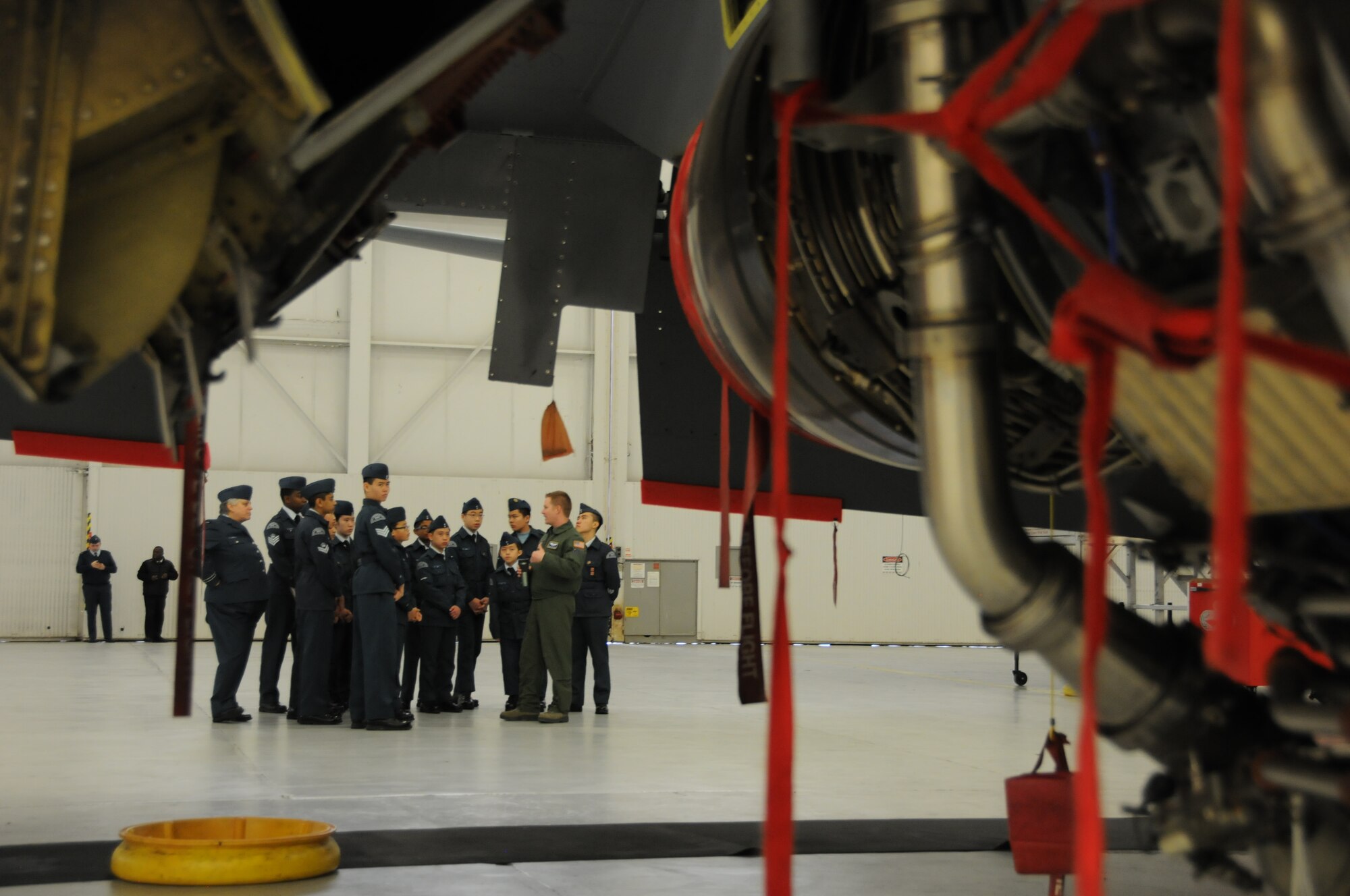 First Lt. Grant Colburn, 756th Air Refueling Squadron pilot, showcases 459th Air Refueling Wing missions to a squadron of Royal Canadian Air Cadets inside a hangar on the Joint Base Andrews, Md., flight line March 15, 2016. The tour group observed the inner workings of a KC-135R Stratotanker engine, boom arm and cargo area as well as discussed life as a U.S. Air Force Reserve member with citizen Airmen. (U.S. Air Force photo/Staff Sgt. Kat Justen)  