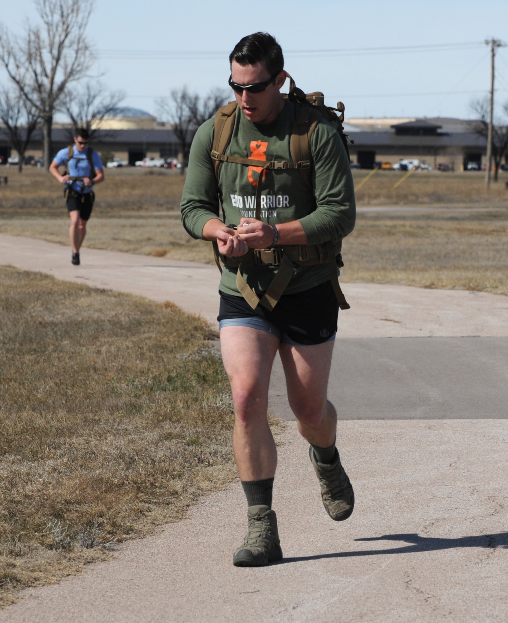 Staff Sgt. Scott Greco, 28th Civil Engineer Squadron explosive ordinance disposal technician, participates in the Rucksack March 10K at Ellsworth Air Force Base, S.D., March 11, 2016. Participants were required to carry a minimum of 35 pounds in their rucks during the event. (U.S. Air Force photo by Airman 1st Class Denise M. Nevins/Released)