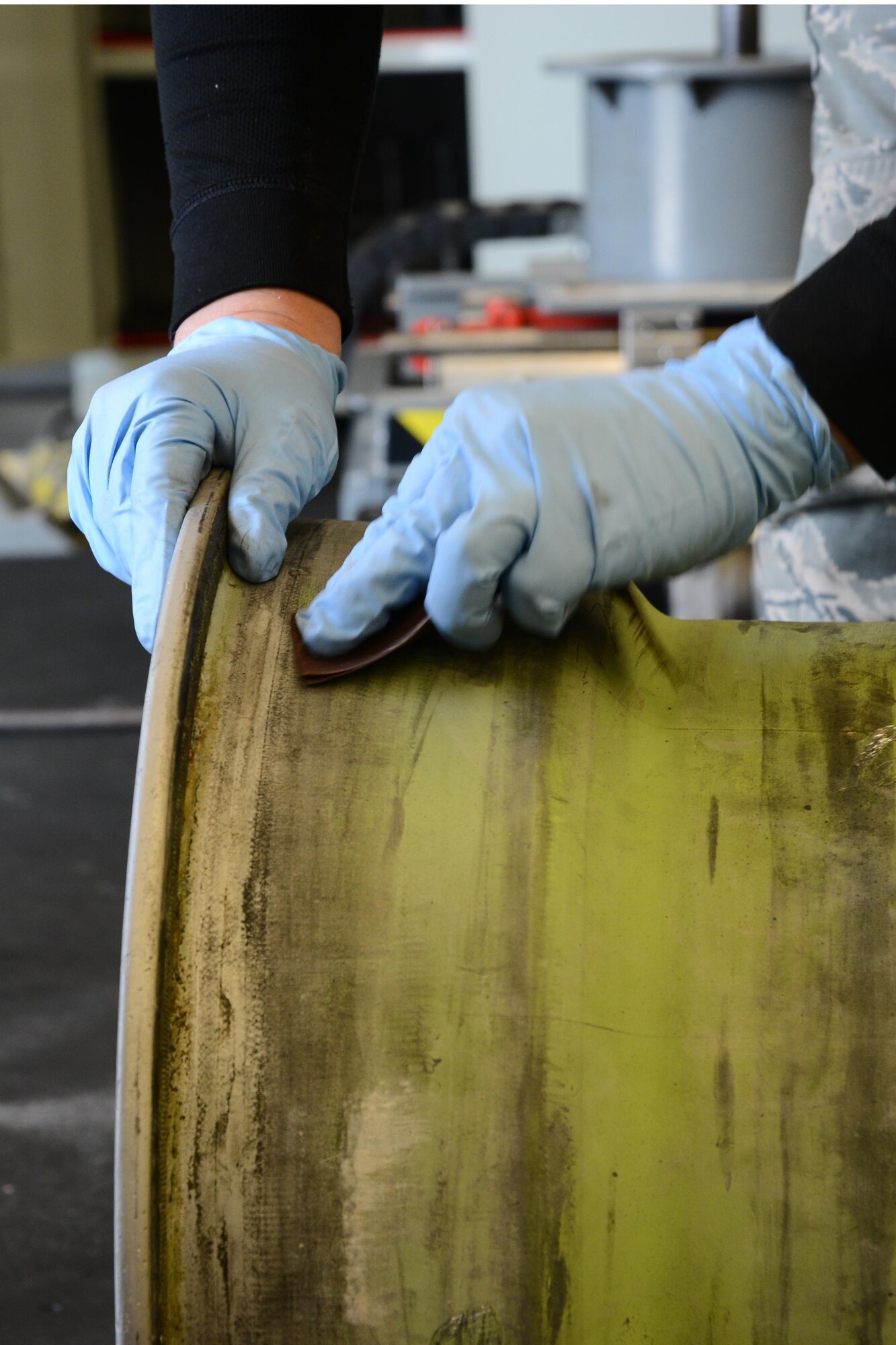 A 22nd Maintenace Squadron wheel and tire section inspection Airman prepares a B-29 Stratofortress wheel so that a new tire can gets a good seal, March 11, 2016, at McConnell Air Force Base, Kan.  The wheel replaced a weather cracked wheel that was not safe for taxi-ing speeds. (U.S. Air Force photo/Airman 1st Class Christopher Thornbury)